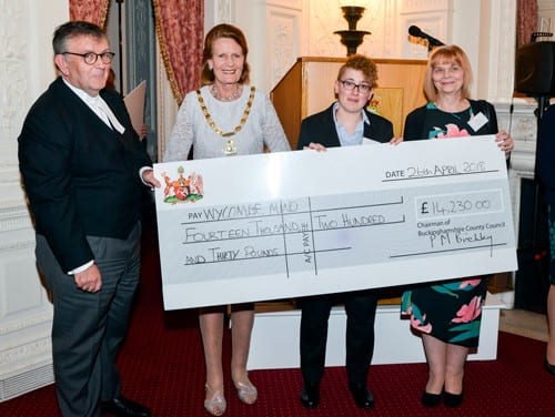 Patricia Birchley and Judge Francis Sheridan present a cheque to Wycombe Mind
