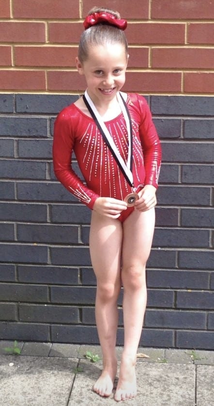 Caitlin with an early medal