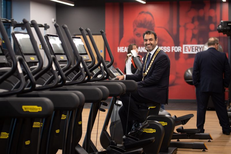 Chairman of Buckinghamshire Council, Zahir Mohammed, trying one of the exercise machines at the Chilterns Lifestyle Centre.