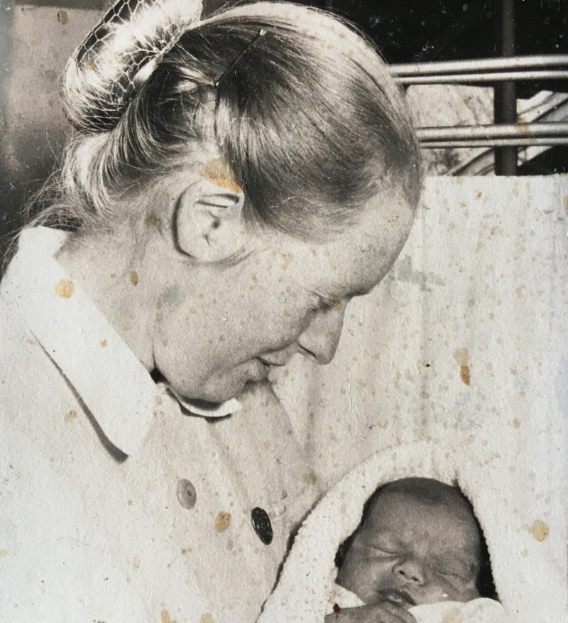 Helen with one of the first babies she looked after